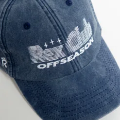 Rex Club | The Offseason 2025 is a blue denim baseball cap with white 
