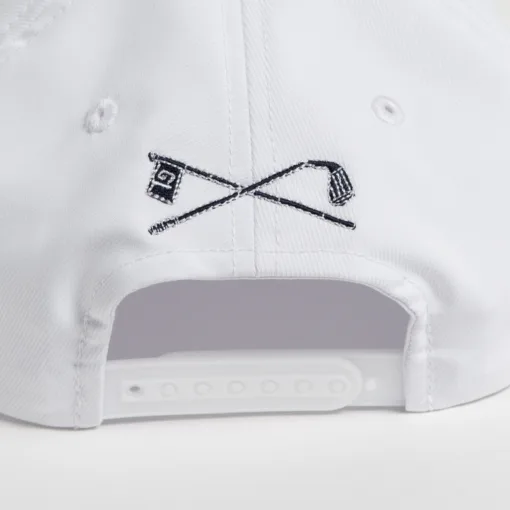 Rex Club | Close-up of the back of a Golf: Quiet Please white cap, showcasing an embroidered design of two crossed golf clubs and a checkered flag above the adjustable snapback strap. | Custom Caps | Custom Hats | Team Headwear | UK