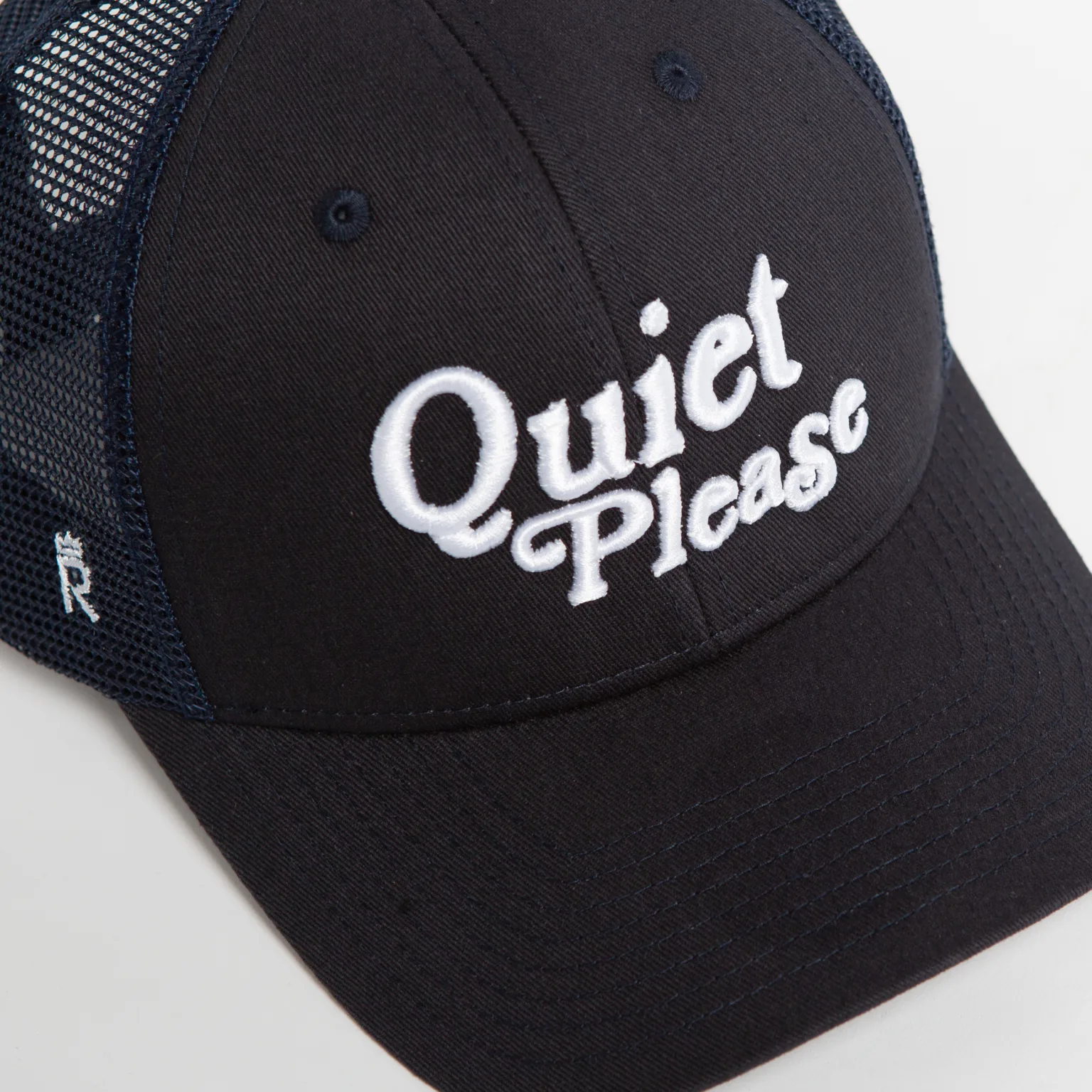 Rex Club | The Golf: Quiet Please is a black mesh baseball cap featuring "Quiet Please" embroidered in large white letters on the front. | Custom Caps | Custom Hats | Team Headwear | UK