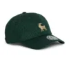 Rex Club | The OFFSEASON 26 is a dark green baseball cap with a curved peak, featuring an embroidered gold goat on the front and a round silver sticker on the peak. | Custom Caps | Custom Hats | Team Headwear | UK